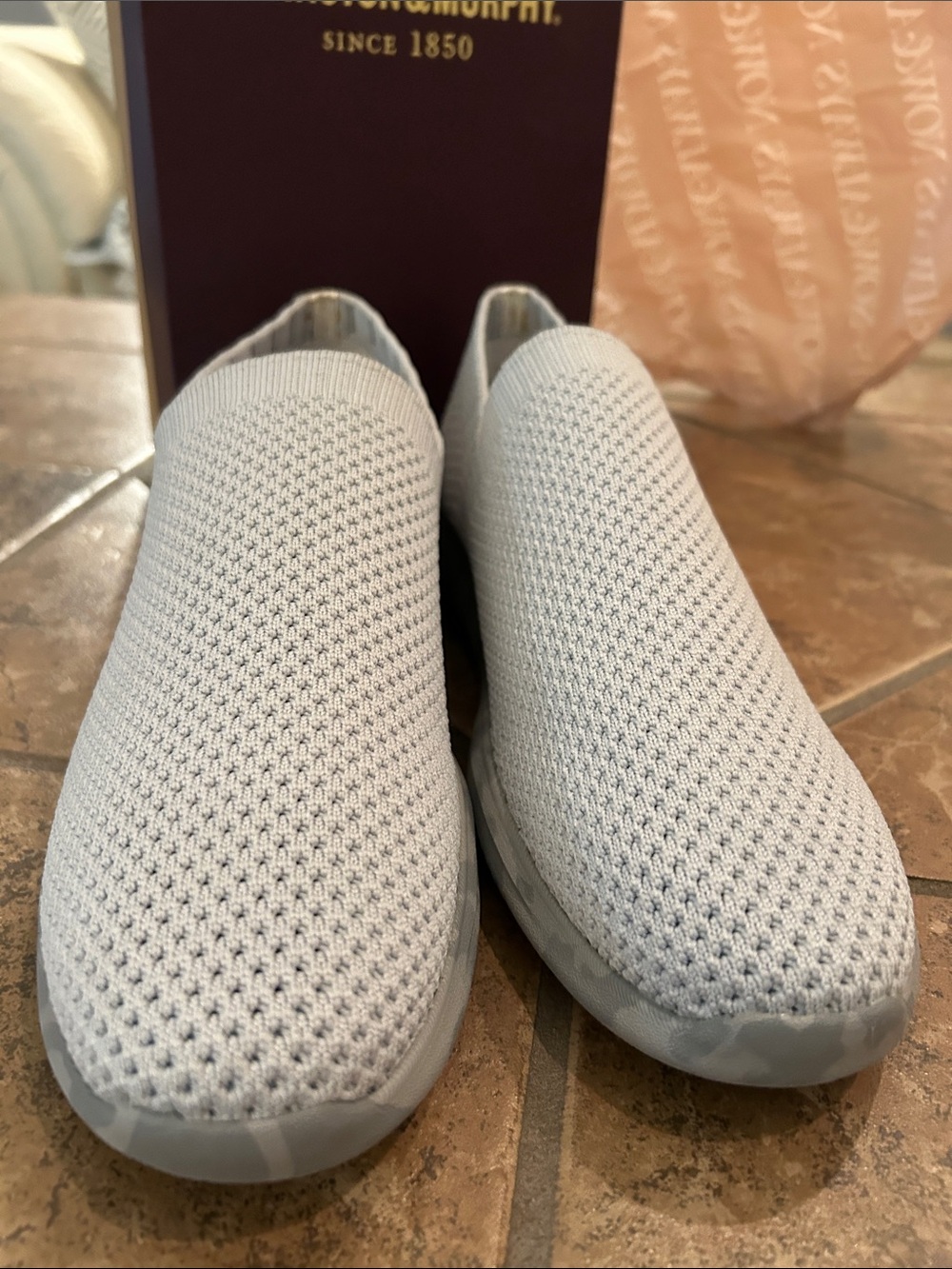 Never worn Johnston & Murphy gray knit slip on, size 8 and a half.  Brand new.